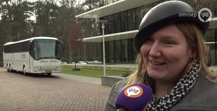 Mienke de Wilde in front of 'her' anti-Trump bus